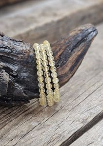 Guldrutilkvarts, armband 6mm runda pärlor