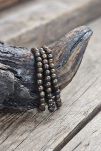 Bronzit, armband 6mm runda pärlor