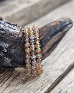 Lila och Gul Fluorit, armband 8mm runda pärlor
