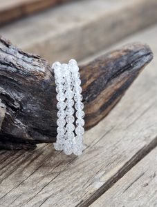 Krackelerad Bergkristall (Fire and Ice), armband 6mm runda pärlor