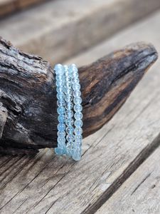 Blå Topas extra, armband 6mm runda pärlor