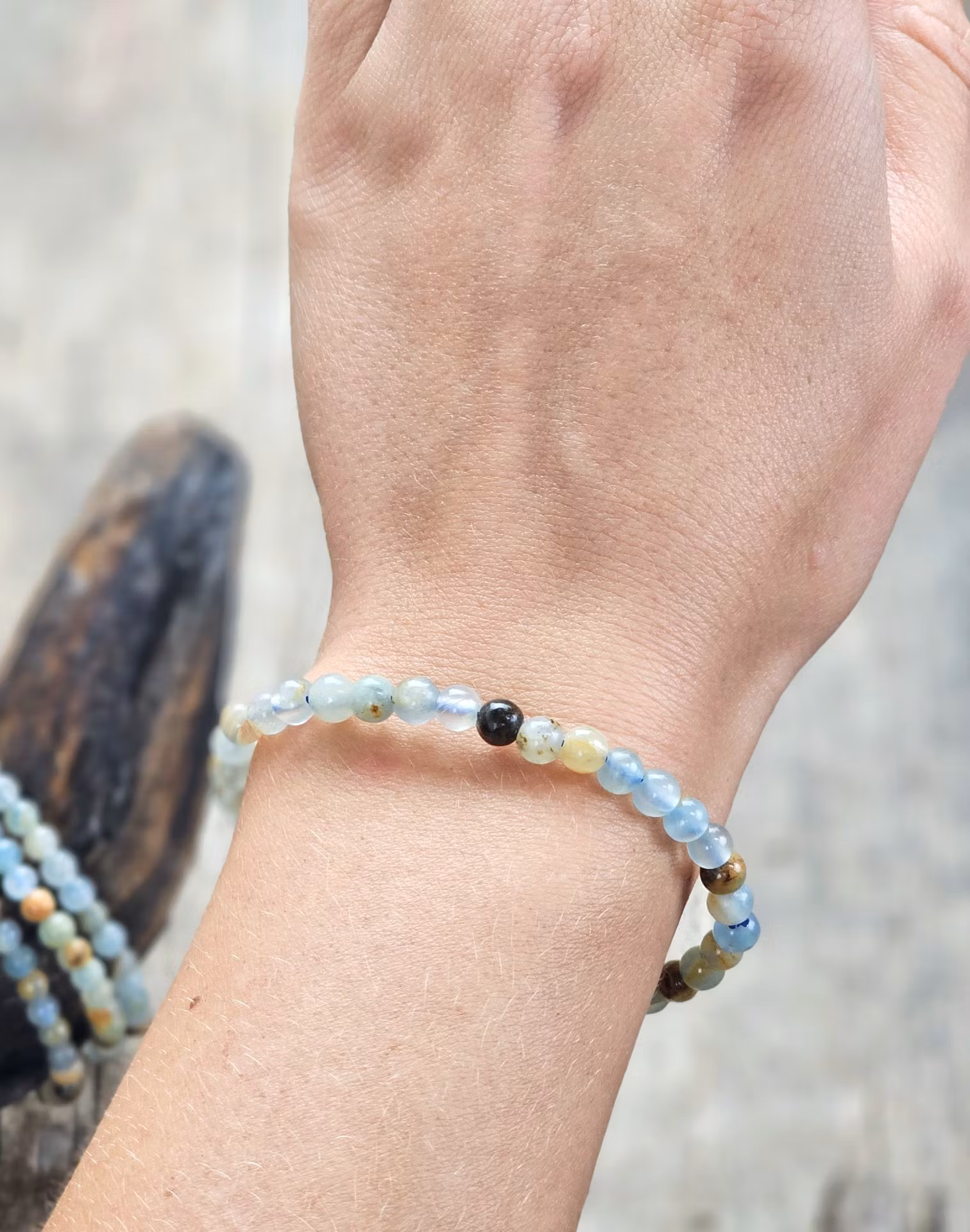 Blå/Brun Onyx, armband 5-6mm runda pärlor