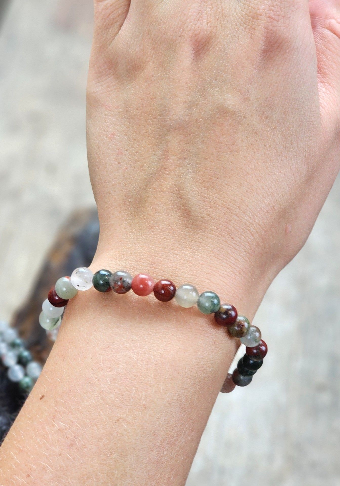 Vulkanjaspis, armband 6mm runda pärlor