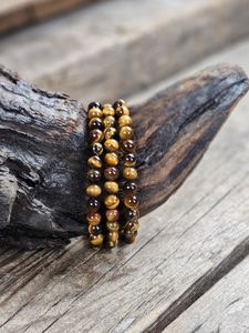 Tigeröga, armband 6mm runda pärlor