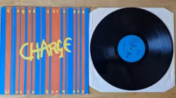 Charged, Caged & Staged. Vinyl LP