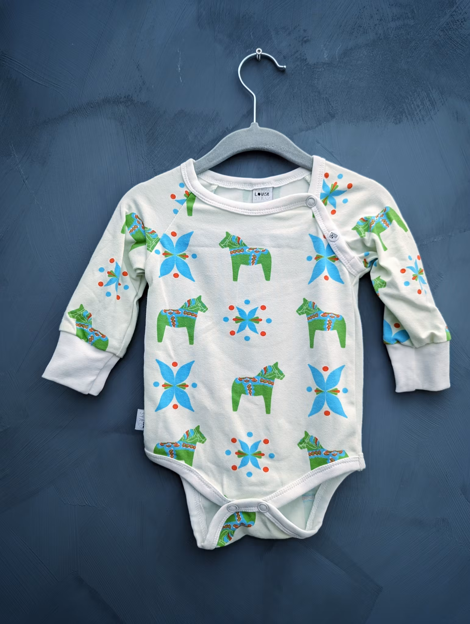 Ekologisk body med dalahästar