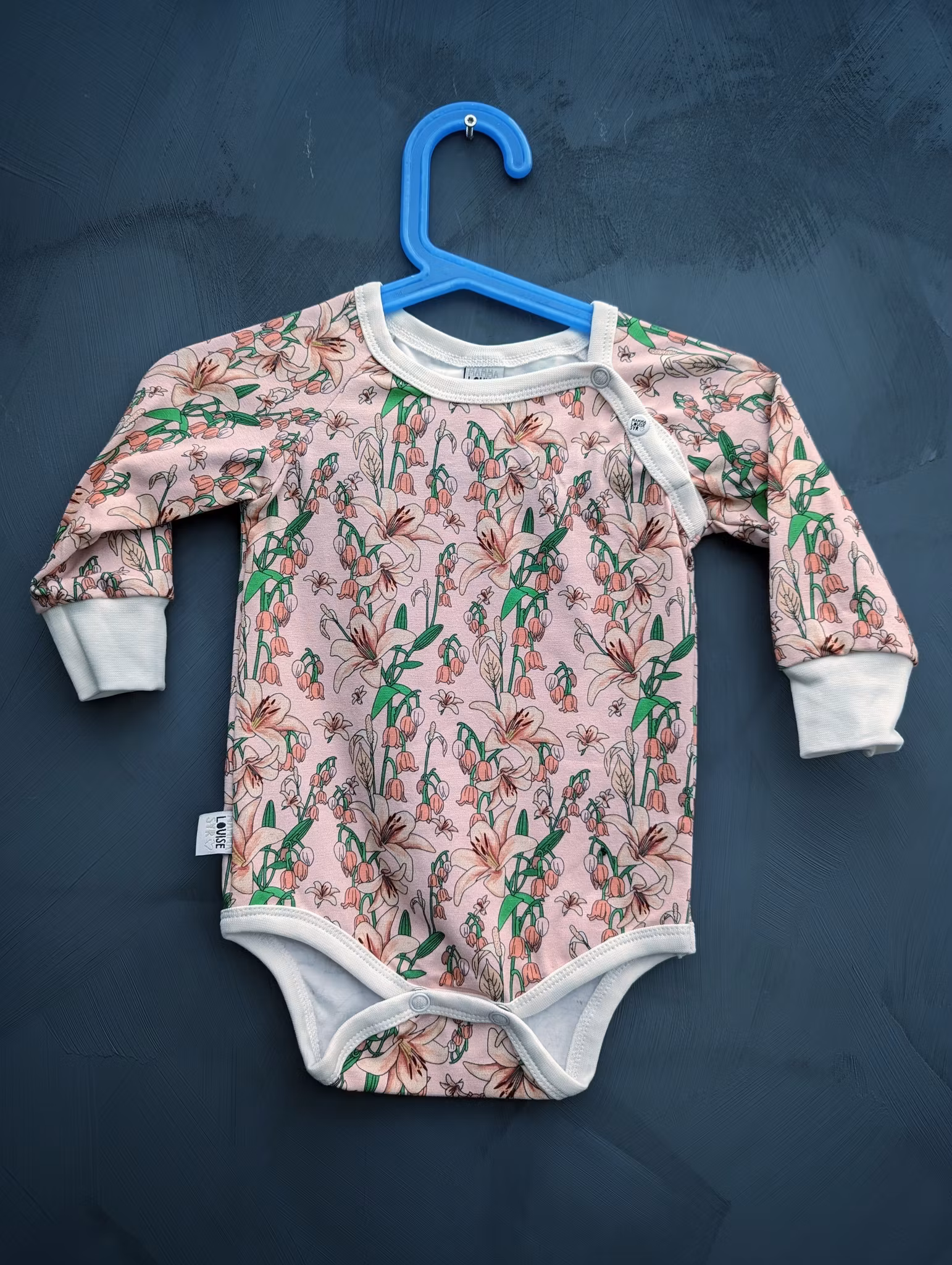 Ekologisk body med rosa blommor