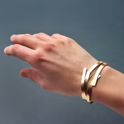 ARMBAND i rött guld