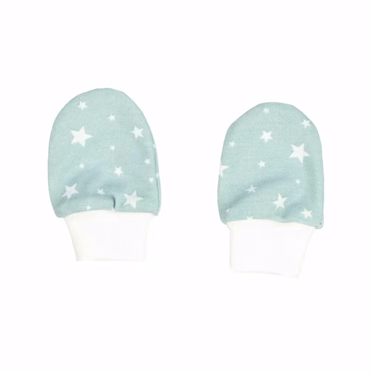 Vantar med stjärnmönster från kollektionen Teal Stars. Vantarna har mudd vid handleden.