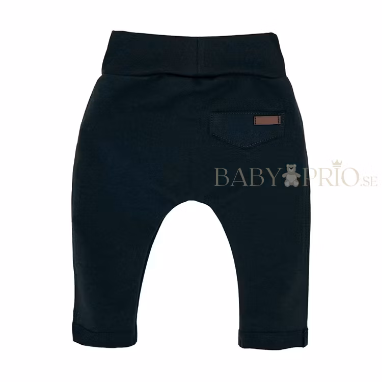 Baksida av eleganta svarta sweatpants med fickor - Ellegance