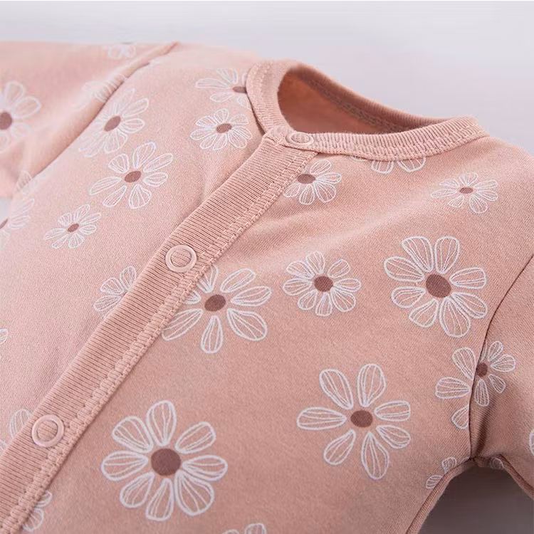 Rosa långärmad jumpsuit med blommor - Daisy