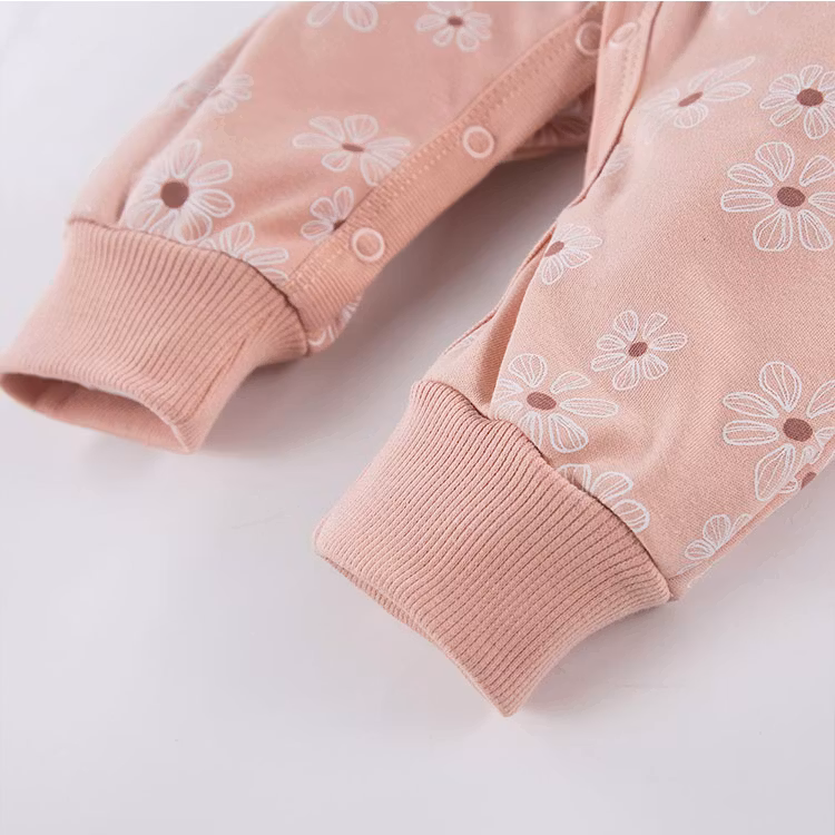 Rosa långärmad jumpsuit med blommor - Daisy
