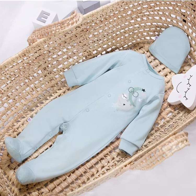 Mintgrön sparkdräkt i korg med sött motiv - Baby Mellow