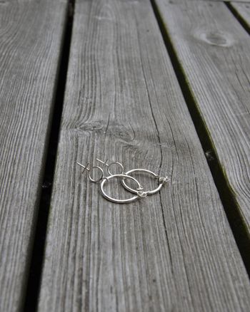 Venus Hoops - örhängen i silver med kvinnosymbol
