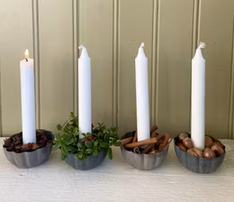 Ljusstake med vågig kant