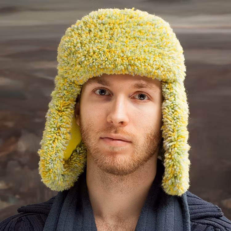 Hood med tuftad bräm