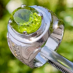 8.50 Carat natural untreated Peridot, Handmade silver ring with certificate
