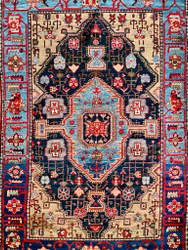 Antiker handgeknüpfter Perserteppich