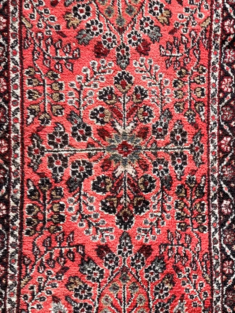 Antik handknuten persisk mattan