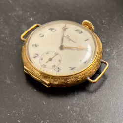 Longines fickur i 18 k guld