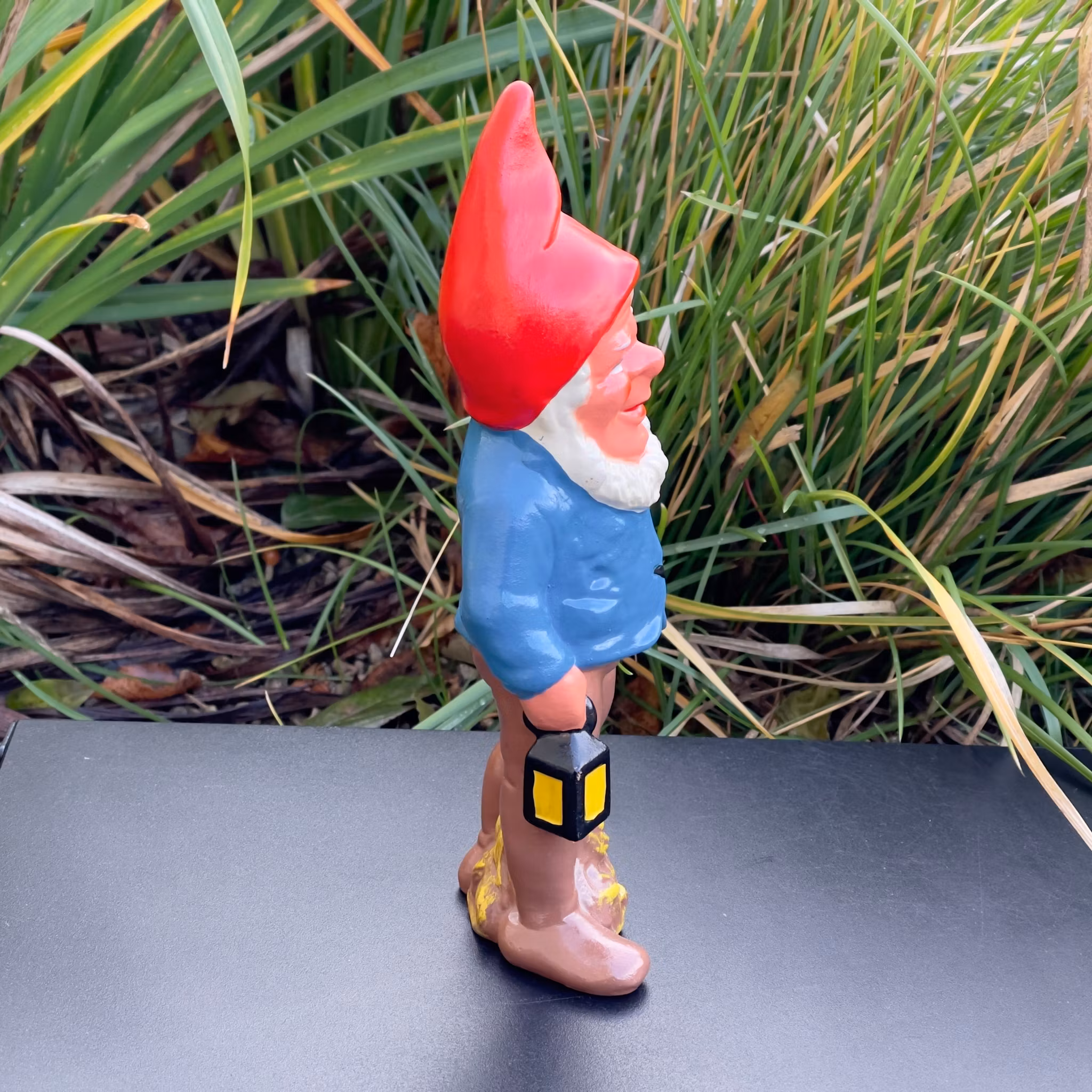 Vecchio Babbo Natale in terracotta con lanterna