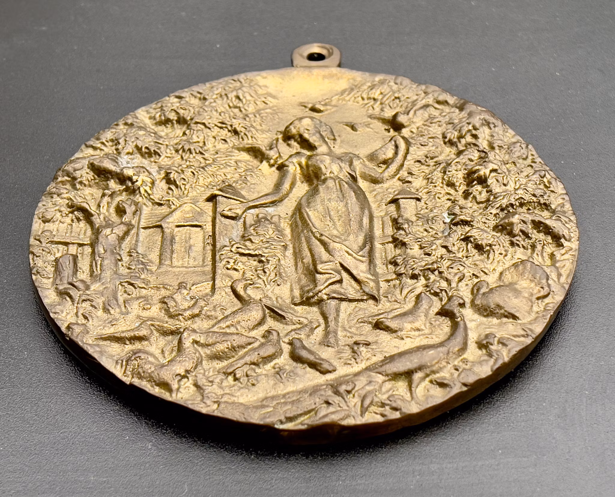 Medal Zosi karmiącej drób 1885