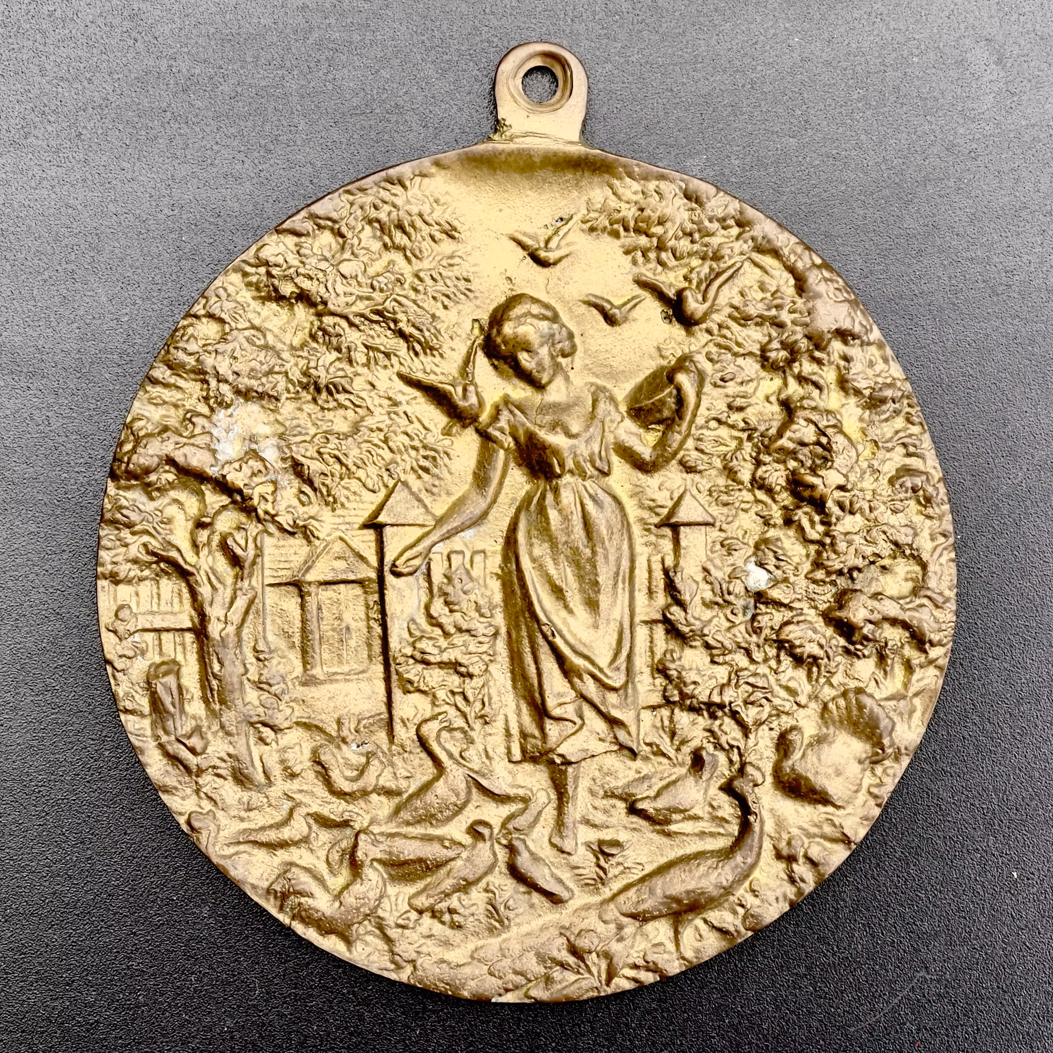 Medal Zosi karmiącej drób 1885