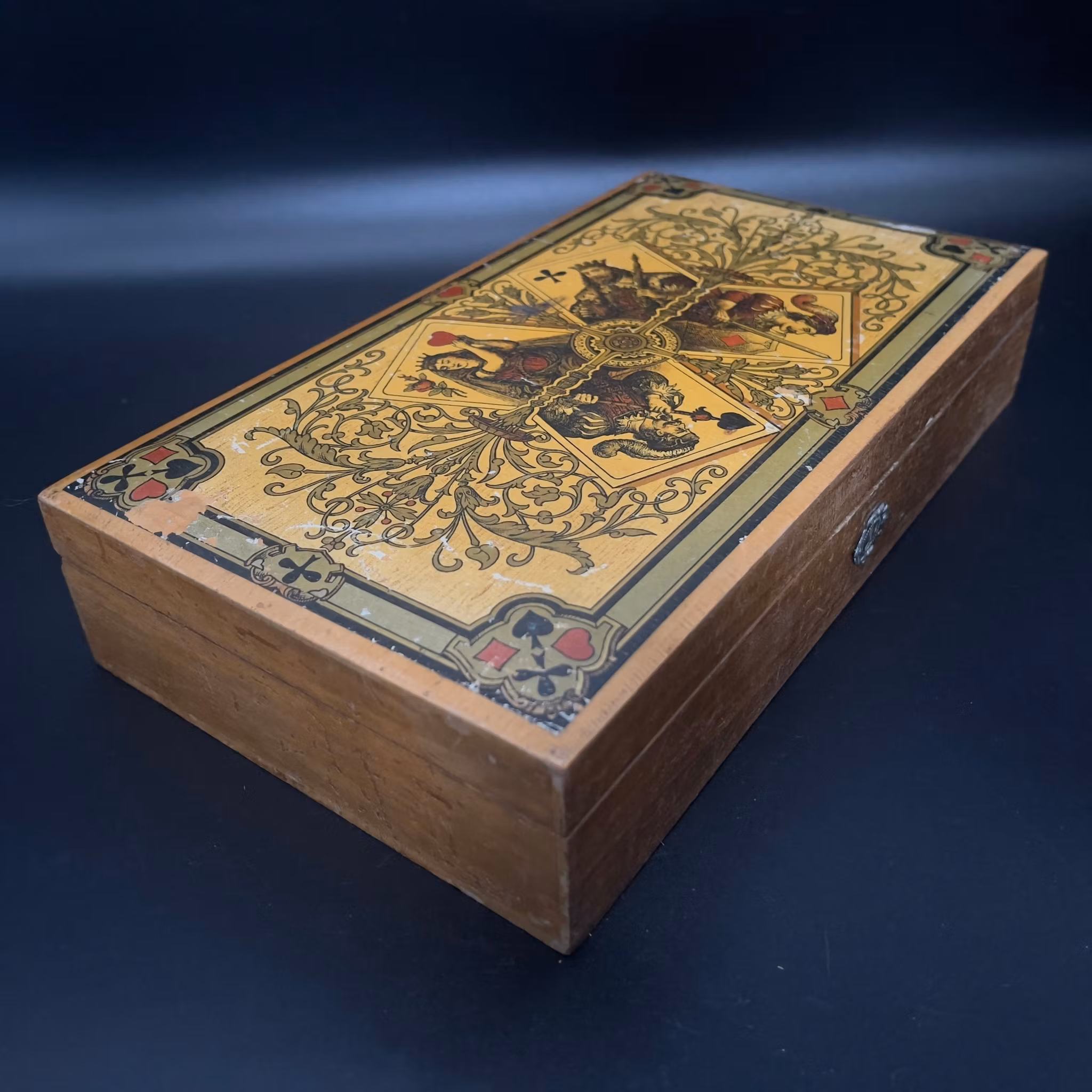 Antique playing card set and chips in wooden box