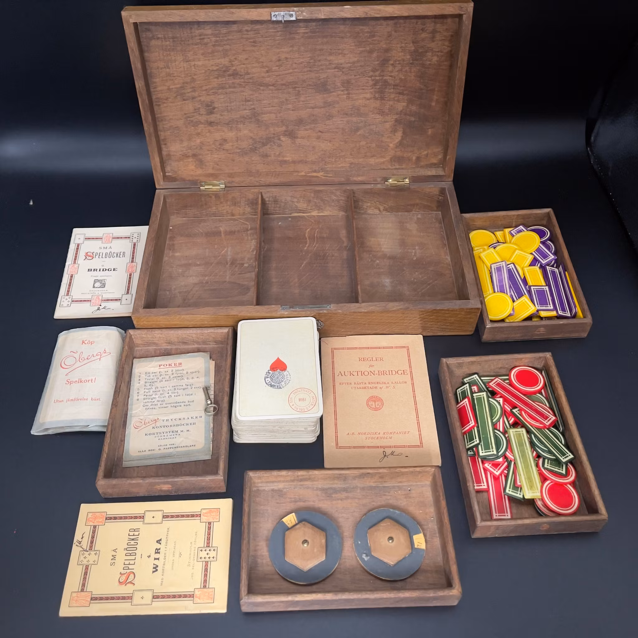 Antique playing card set and chips in wooden box