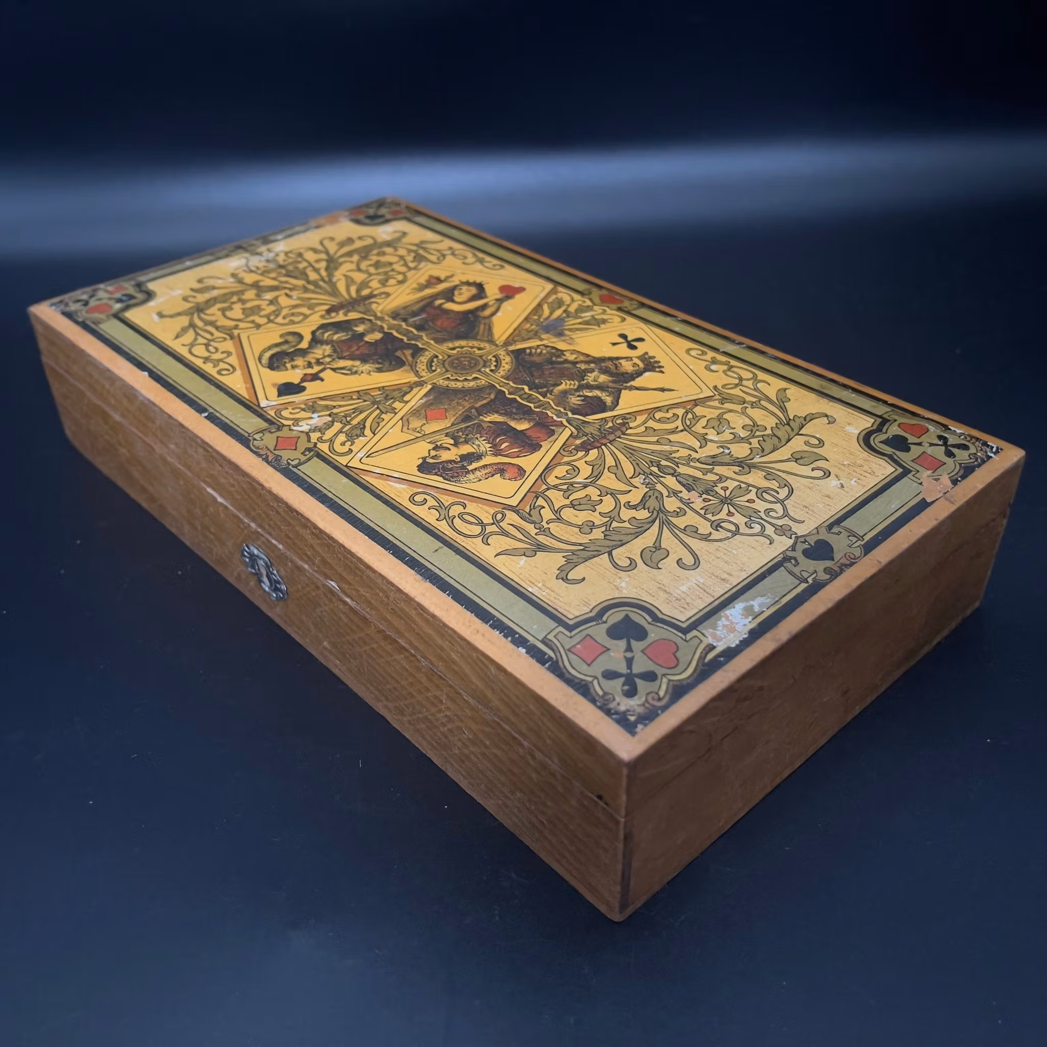 Antique playing card set and chips in wooden box