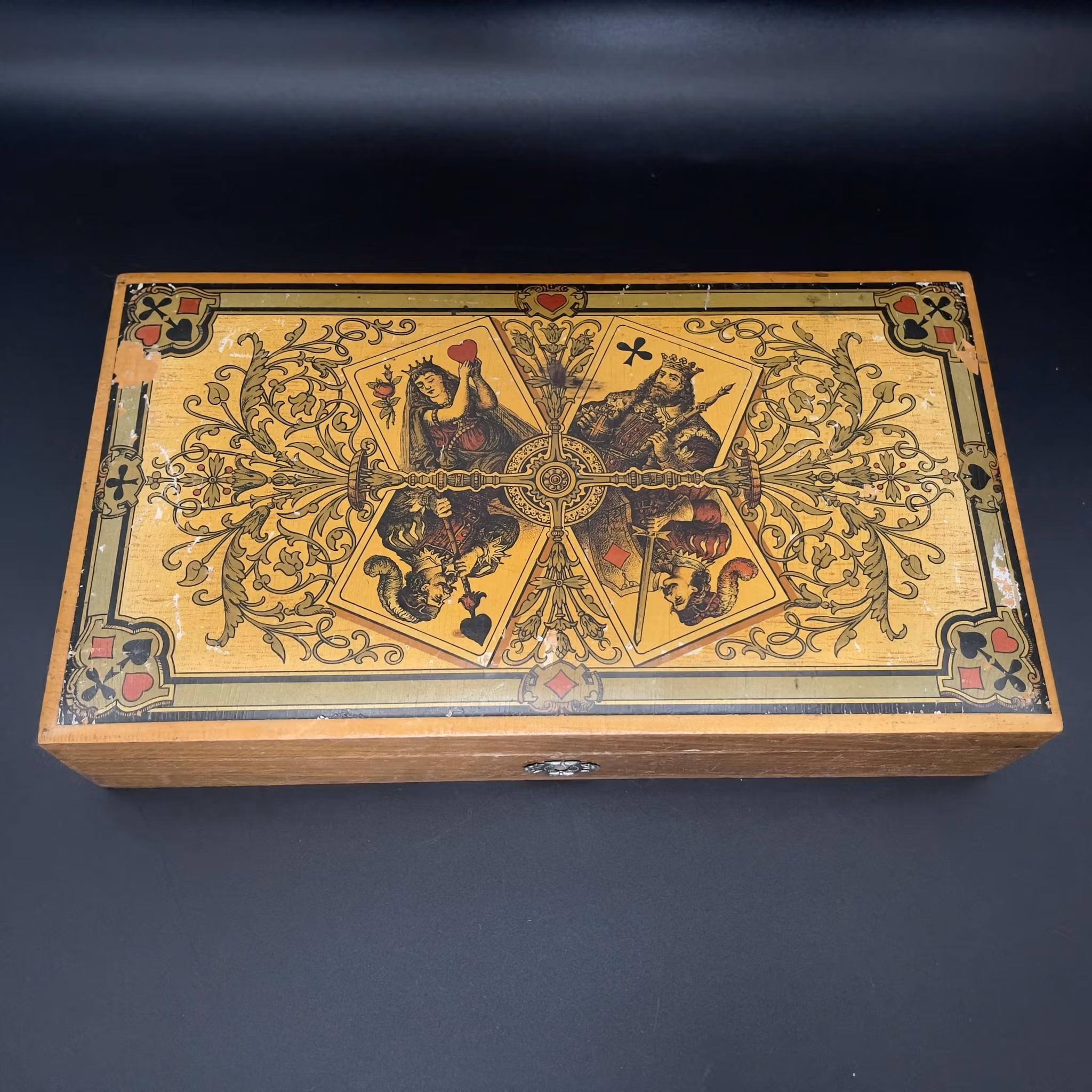 Antique playing card set and chips in wooden box