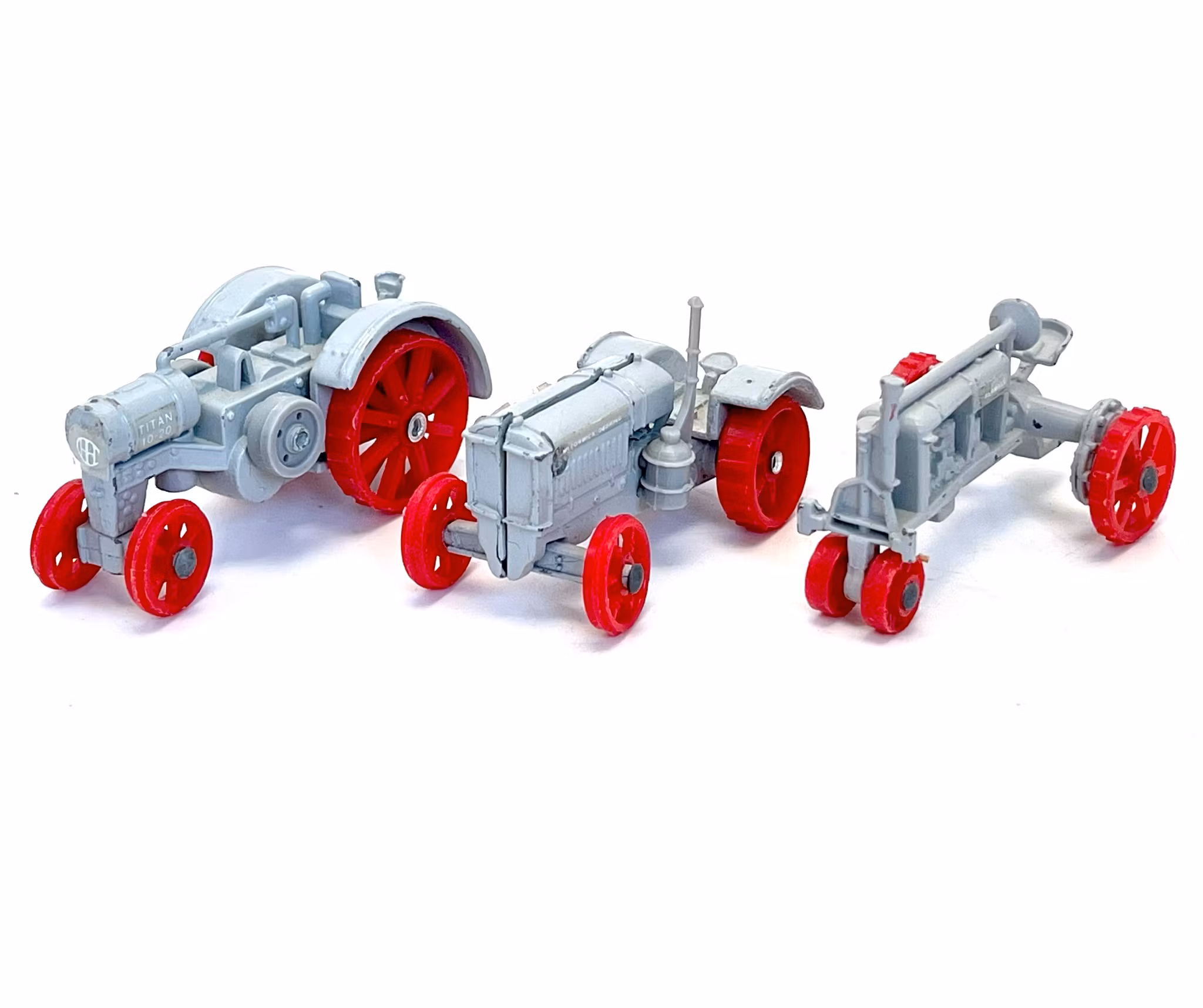 Vintage, 3 pequeños tractores Ertl.