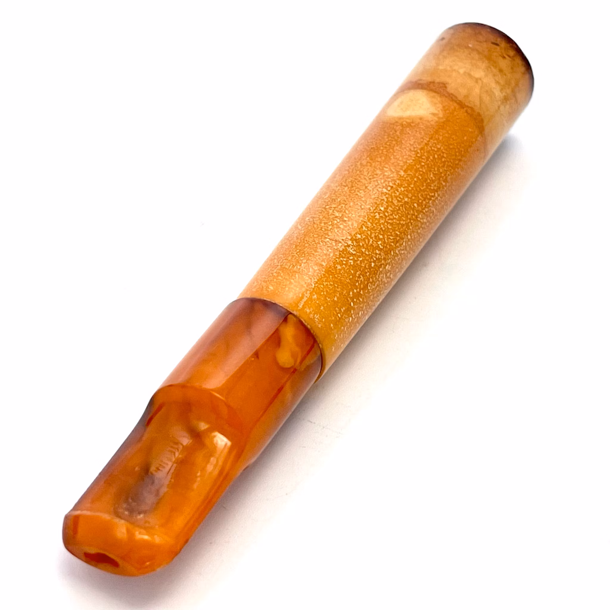 Boquilla de cigarrillo antigua de color ámbar