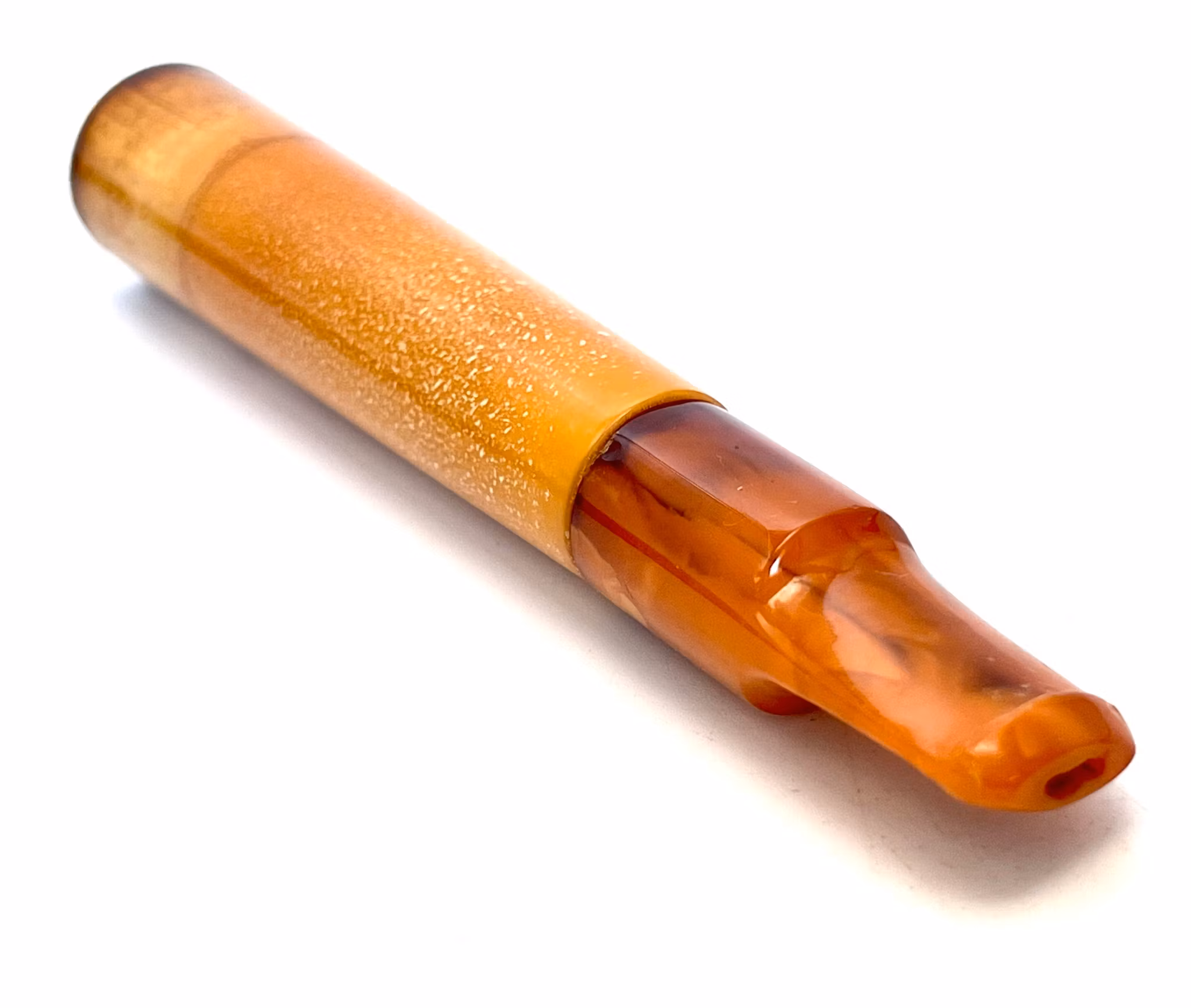 Boquilla de cigarrillo antigua de color ámbar