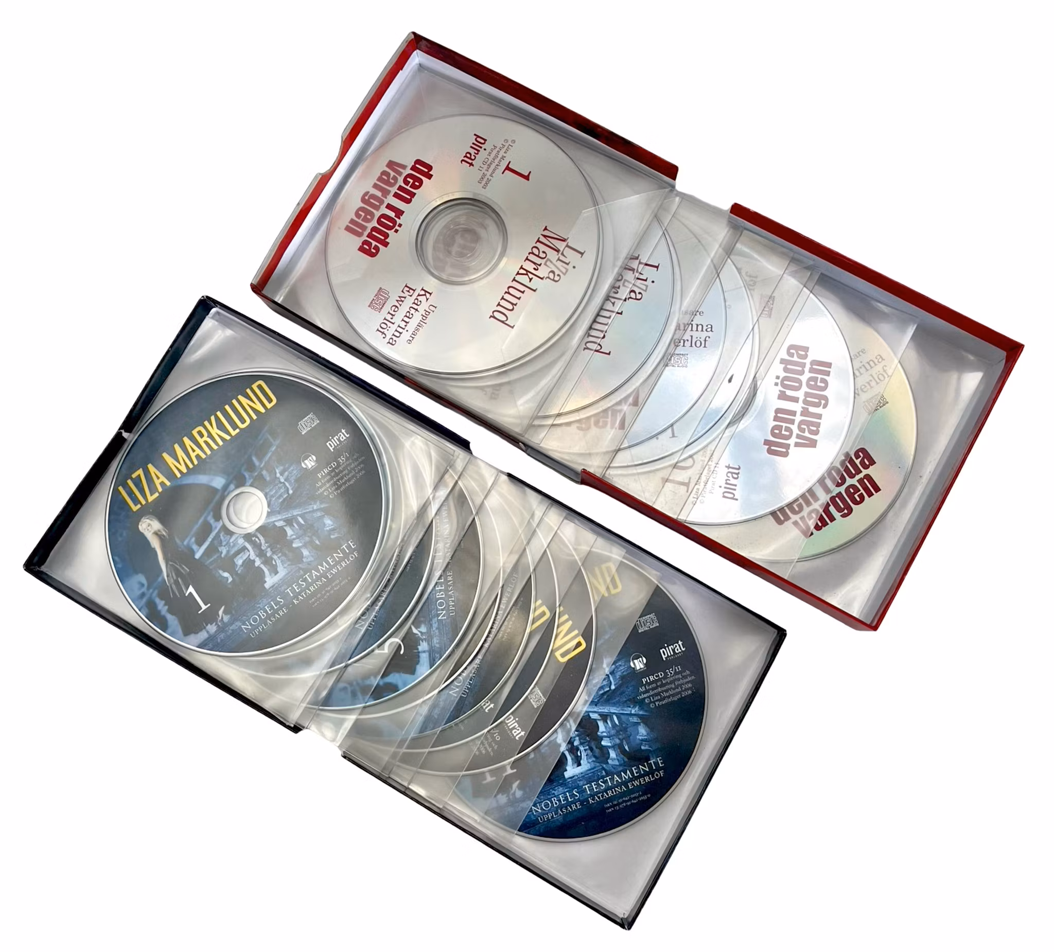 Kaksi äänikirjaa 22 CD:llä, Liza Marklund, Punainen susi ja Nobelin testamentti