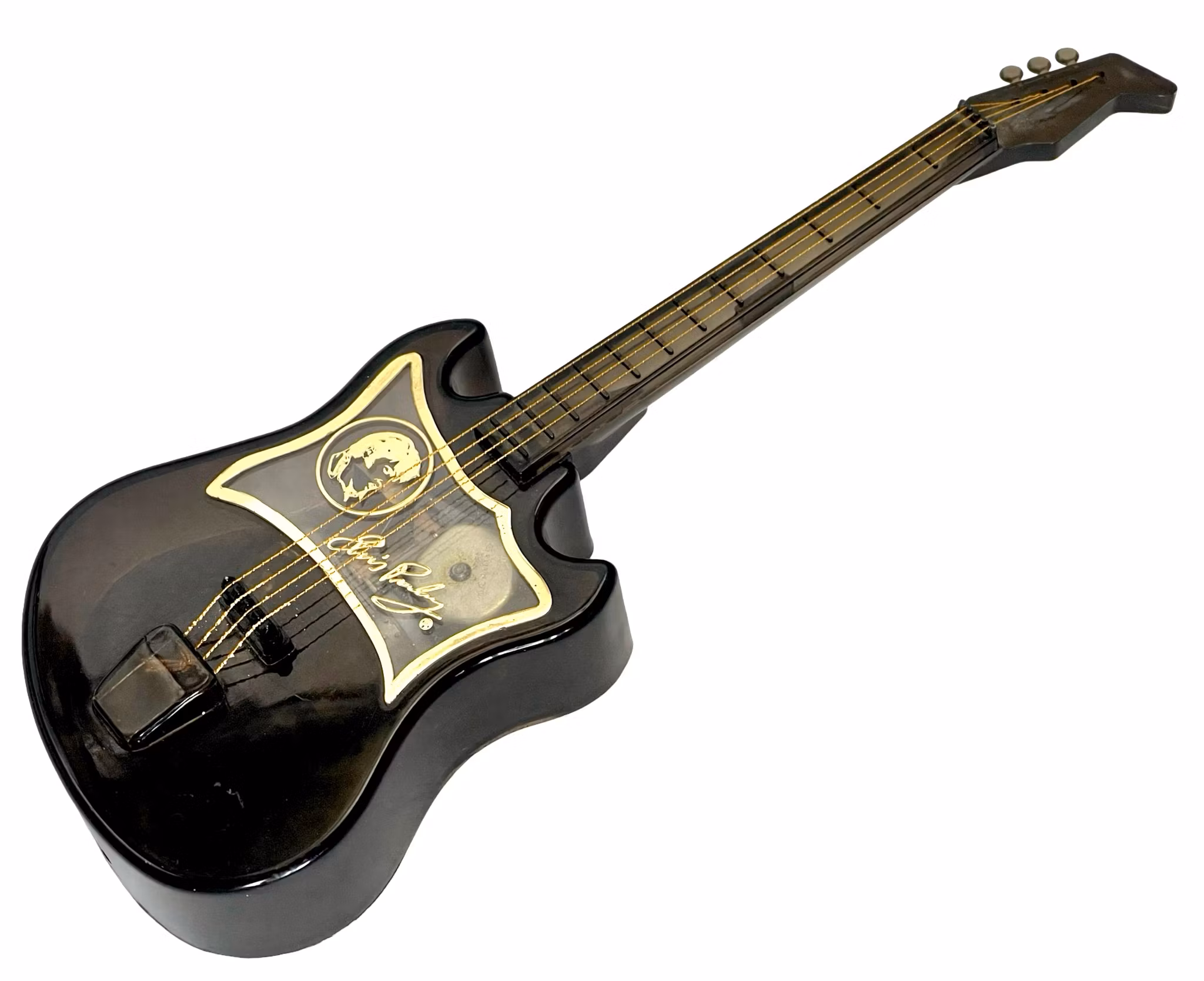 Elvis sin gitarformede musikkboks – snurrer og spiller sangen Love Me Tender