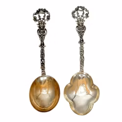 GEWE skedar i silver, dekor rosor, 1957