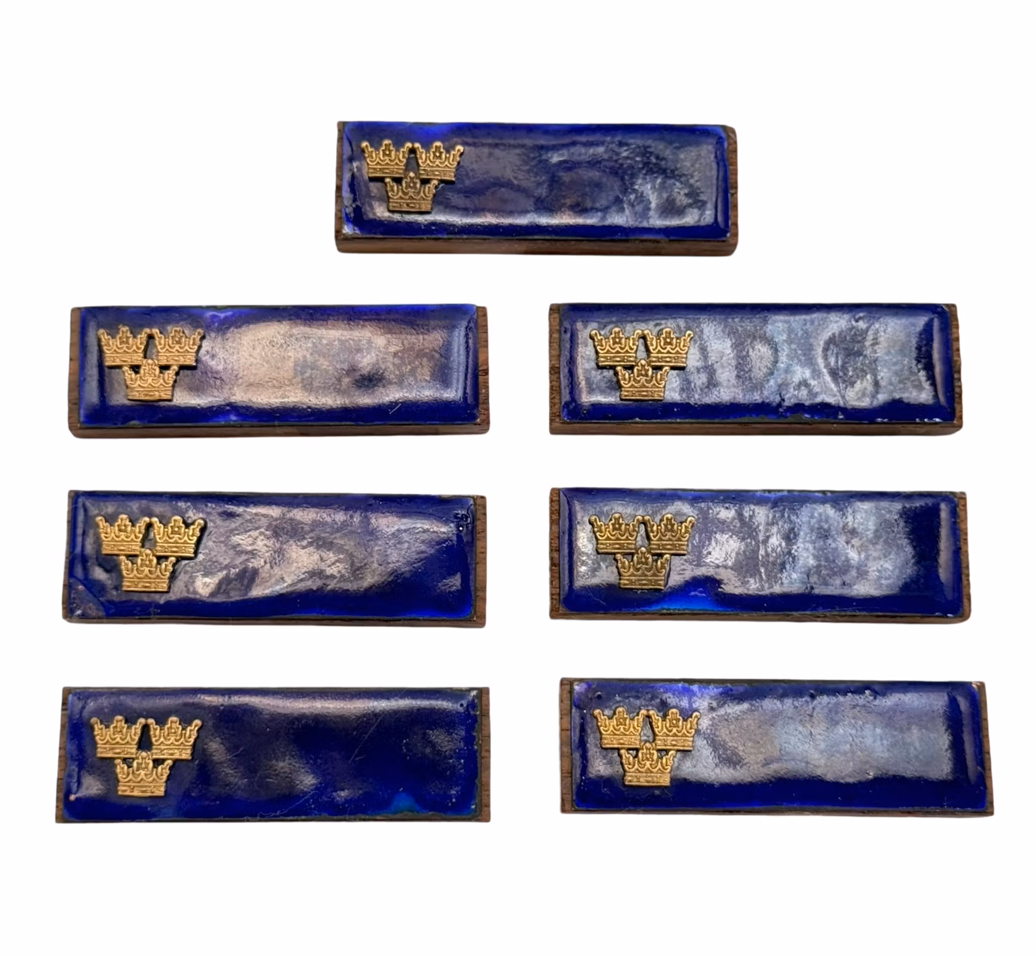 7 pcs, Wood and blue enamel with three Kronor marks, Sweden