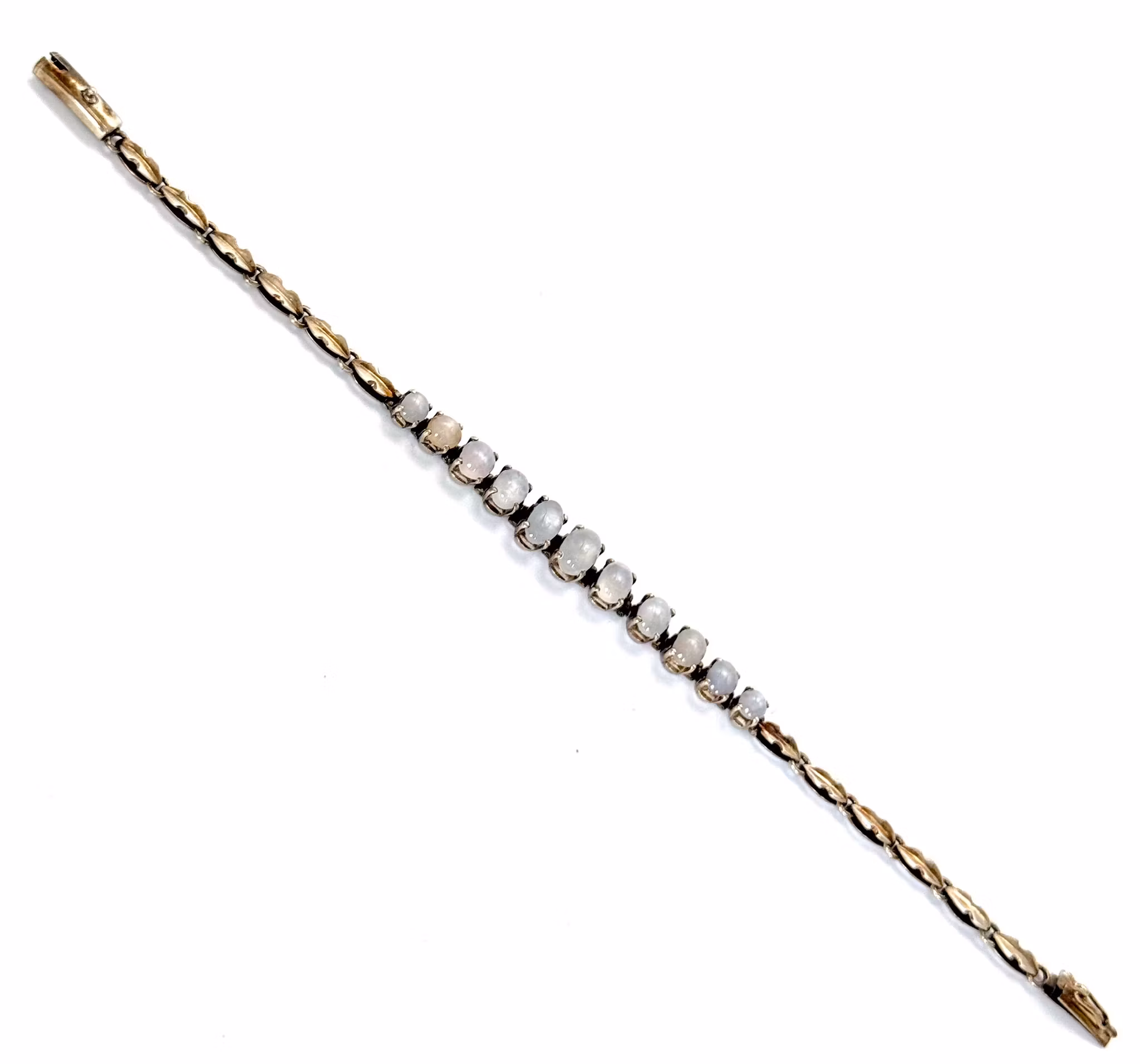 ARMBAND mittdekor av 11 stjärnsafirer