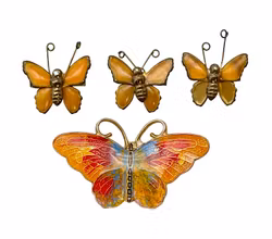 4 SPILLE a forma di farfalla con decorazione in smalto.