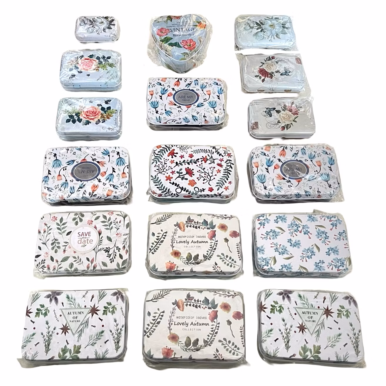 Set med 18 plåtburkar – Olika färger och mönster