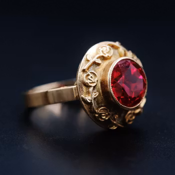 Ring i 14K guld med röd sten