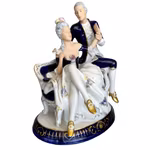Royal Dux - Porslinsfigur, romantiskt rokokopar på soffa, Tjeckoslovakien