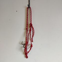 Röd repgrimma