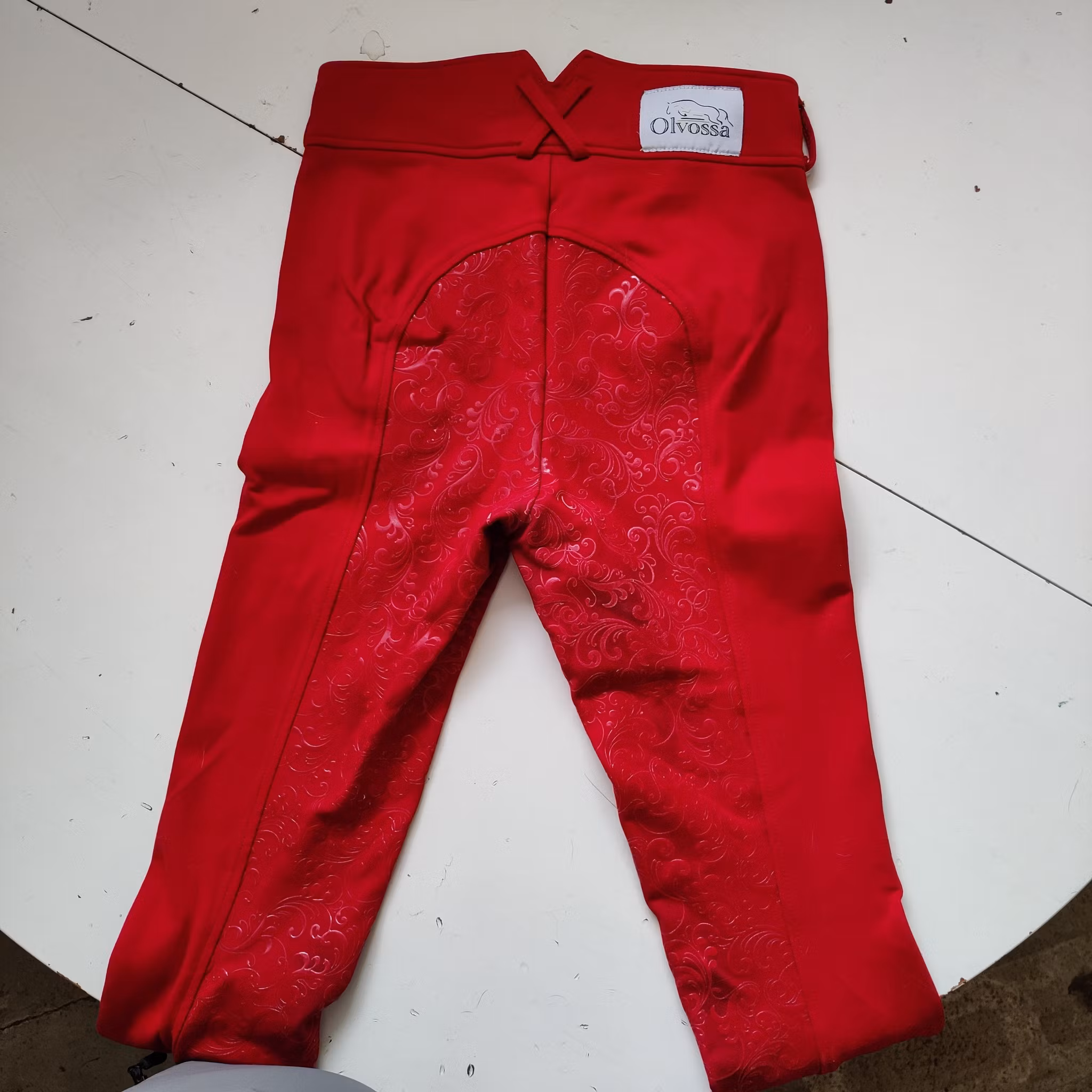 Röda ridbyxor med helgrip Olovossa strl 8/XS
