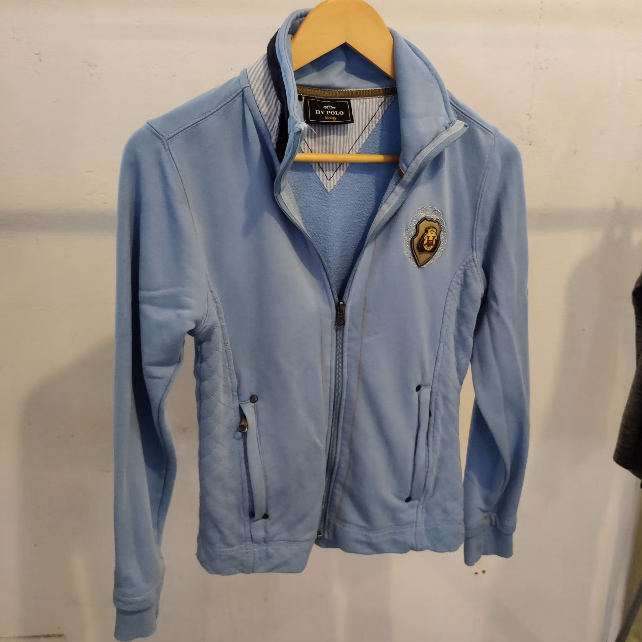 Ljusblå svettisjacka HV Polo SMALL