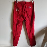 Röda knäskodda ridbyxor John Whitaker strl 40