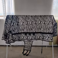 Flugtäcke med fast hals zebra 165 cm