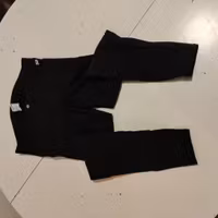 Mörkblå ridbyxor med tygskoning strl 36