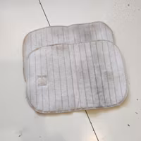 2 vita bandageunderlägg